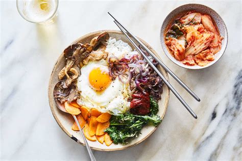 Bibimbap, a bowl of rice mixed with meat and assorted vegetables, is one of the all time favorite meals of the Korean people, regardless of age or generation. . Bibimbap and tamago nyt
